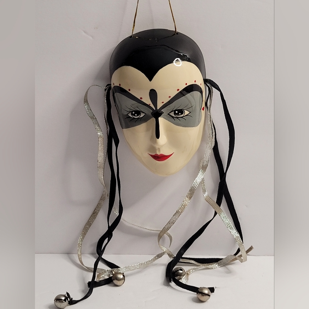 "Decorative Venetian-Style Mask with Ribbons and Bells."  342